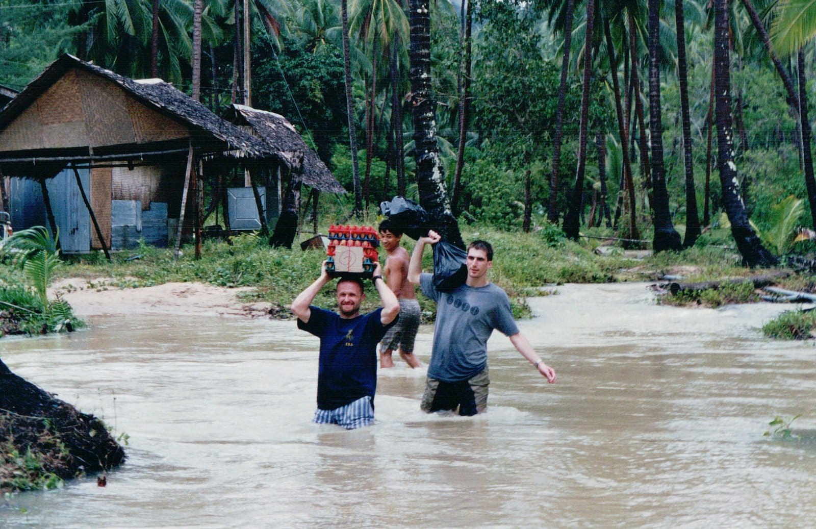 Helping locals after flood in Ko Pha Ngan